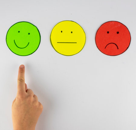 Set of three hand made customer satisfaction icons with a finger pointing on the green, happy one. All isolated on a white background.の写真素材