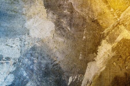 Blue and yellow surface texture decorative plaster. Stylized banner with copy space. Grungy concrete wall with colorful lighting.の写真素材