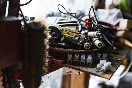 Concept of bygone time. Abandoned workplace. Dust and web workspace.の写真素材