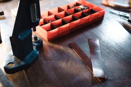 Tanner workplace in soft focus. Leatherwork concept.の写真素材
