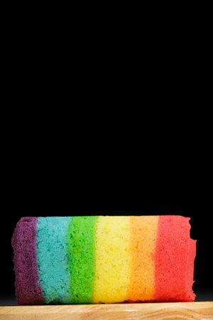 A rainbow cake, jajan pasar, Indonesia traditional food,  variety of sweet cakes that are deliciously colorful. selective focus on cake.の写真素材
