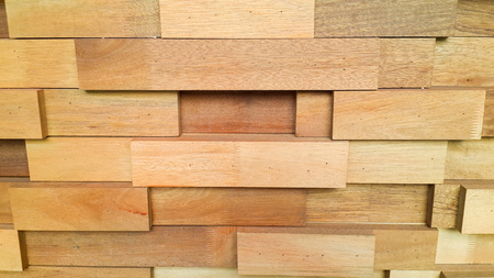 Stack of lumber.Textured of wooden cube background, wooden backdrop. Decoration wooden blocks,paneling pattern,seamless background,Interior Design wall,Fine natural texture,Continuous replication.の写真素材