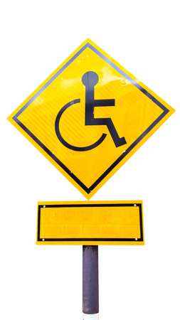 Reserved parking for Handicapped Only sign with copy space beneath isolated on white background. Handicap sign on yellow background.の写真素材