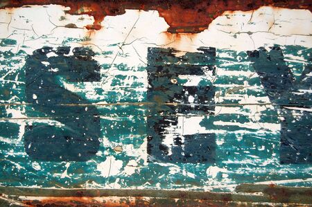 Type stencil on rusty metal surface. Abstract background texture.の写真素材