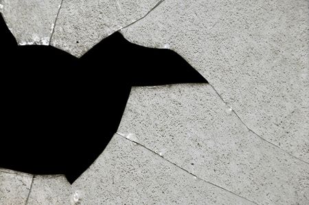 Broken glass fragments surface texture. Abstract background.