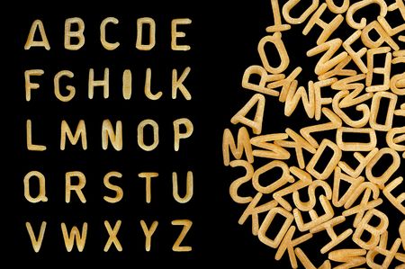Alphabet soup pasta font. Letters made from kids food.の写真素材