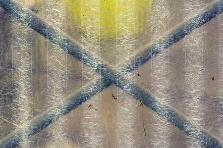 Corrugated transparent plastic sheeting. Abstract grungy background.の写真素材