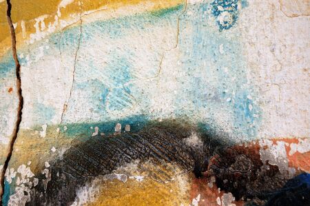 Detail of a cracked paint stained wall.の写真素材