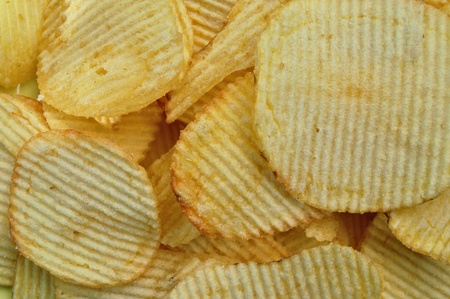 Potato chips food texture. Salty snack background.の写真素材