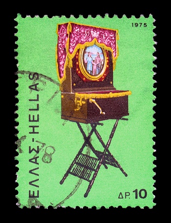 GREECE - CIRCA 1975. Vintage postage stamp with traditional Greek laterna music box portable barrel piano illustration, circa 1975.の写真素材