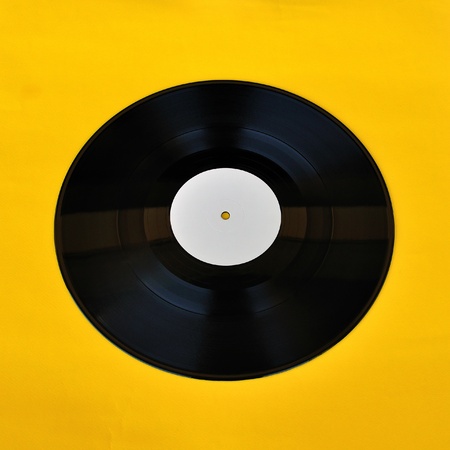 Vinyl record white label promo on yellow background  Music and audio 