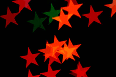 Colorful stars pattern abstract blur on black background.の写真素材