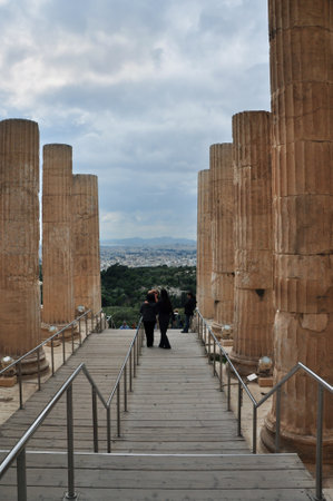ATHENS, GREECE - MAY 6, 2014  Propylea of Acropolis and distant view of the city of Athens, Greece のeditorial素材
