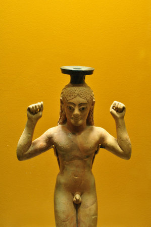 Perfume bottle young athlete binding ribbon on his head as symbol of victory. Ancient agora, Athens Greece.のeditorial素材