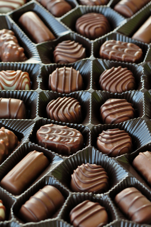Box of chocolates sweet food candy background. Selective focus.の写真素材