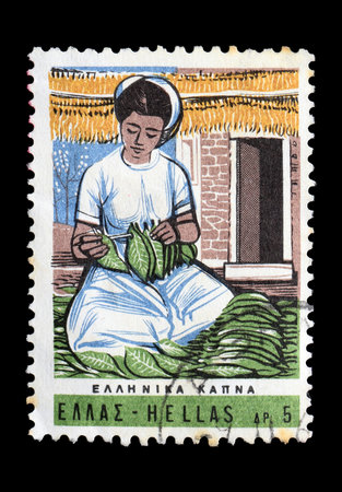 GREECE  CIRCA 1966: Woman farmer processing tobacco leaves vintage illustration on postage stamp printed for the Hellenic Post Office.のeditorial素材