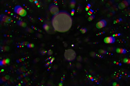 Flashing lights colorful circles blur. Abstract background.