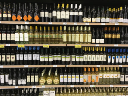 ATHENS, GREECE - JANUARY 23, 2018: Bottles of red and white wine for sale. Alcoholic drink beverage.のeditorial素材