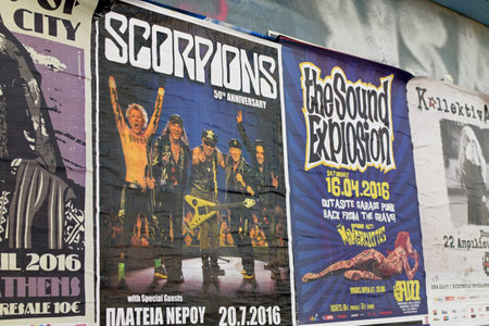 ATHENS, GREECE - APRIL 9, 2016: Wall with concert posters live hard rock music by the Scorpions and garage punk by the Sound Explosion and Mongrelettes.のeditorial素材
