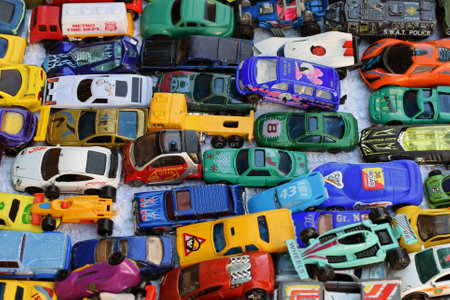 ATHENS, GREECE - OCTOBER 2, 2018: Old toy car collection for sale at street market. Vintage miniature automobile scale model replicas.のeditorial素材