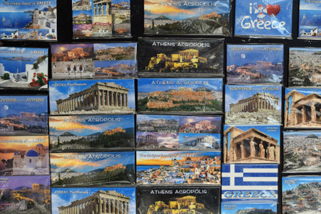 ATHENS, GREECE - OCTOBER 2, 2018: Souvenirs from Greece fridge magnets with Greek landmarks and themes for sale at tourist gift shop.のeditorial素材