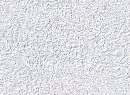 Crumpled white paper surface with creases and folds texture. Abstract grunge background.の写真素材