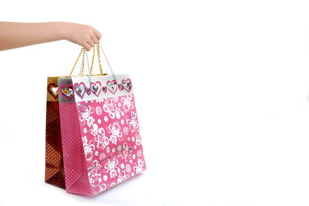 Giving gifts hand isolated on white backgroundの写真素材