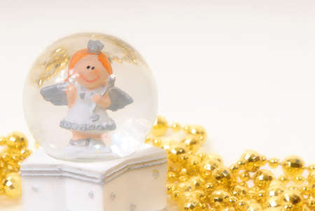 ball of water with fairy happy and golden garlandの写真素材