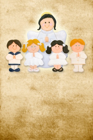 first communion card vertical, angel with a group of children on parchmentの写真素材
