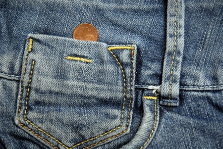 1 cent of euro in the pocket of a jeans  
