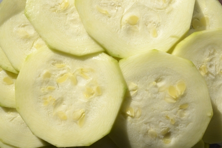 background zucchini slices ready to cookの写真素材