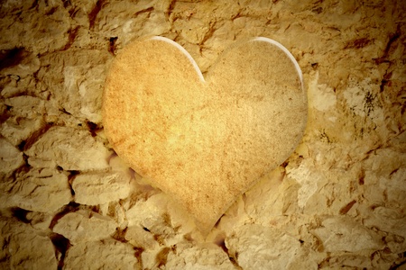 background heart in a stone wallの写真素材