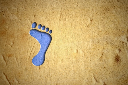 footprint drawing of blue sand, empty space for textの写真素材
