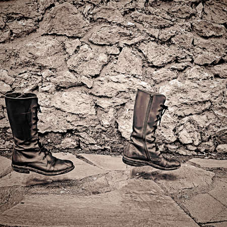 future life way concept, old boots walk aloneの写真素材