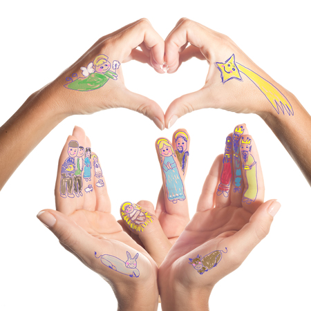Nativity Scene drawn by a small child in his mother's hands, isolated on white backgroundの写真素材