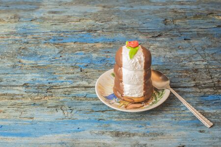 Meringue and chocolat cake on rustic table