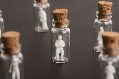 Covid-19 epidemic, protection of older and more vulnerable people, concept. Elderly couple figures...