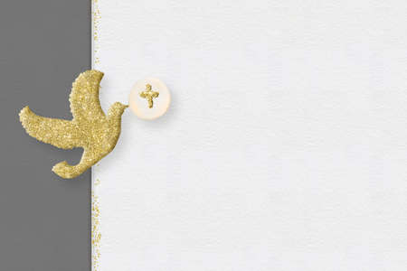 First communion invitations cards backgrounds.Gold glitter dove on a on white and gray paper background with copy space.の写真素材