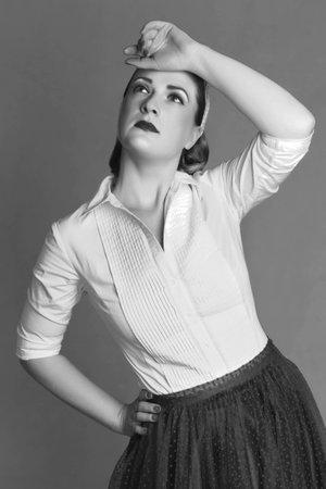 woman blond lost in thought retro style