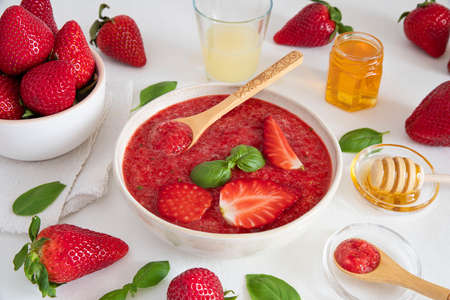 Close-up of a strawberry and basil soup preparationの写真素材