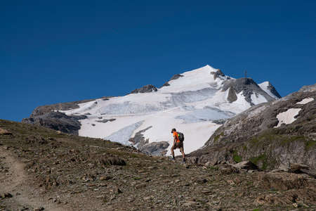 Mountain hiker in summer in Franceの写真素材