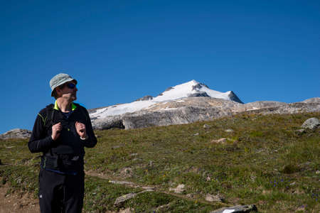 Mountain hiker in summer in Franceの写真素材