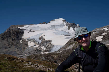 Mountain hiker in summer in Franceの写真素材
