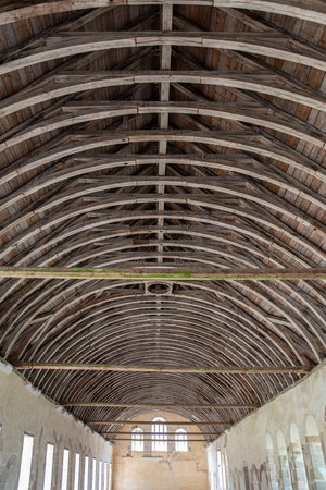 Old wooden frame and tiles seen from inside a buildingの写真素材