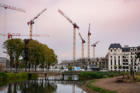 Cranes on a building site in the cityの写真素材