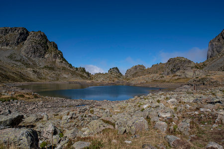 Lake Robert in the mountains of Chamrousse in the Alps in Franceの写真素材