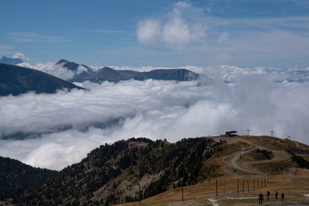 Mountain landscape above the clouds at the top of the Chamrousse mountains in summer in the Alps, Franceの写真素材