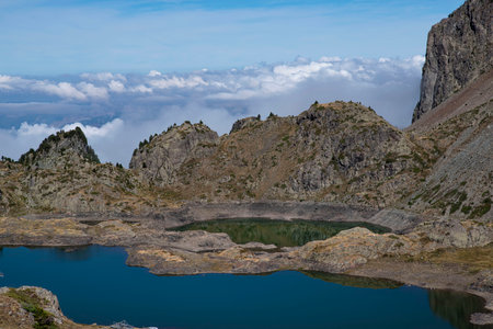 Lake Robert in the mountains of Chamrousse in the Alps in Franceの写真素材