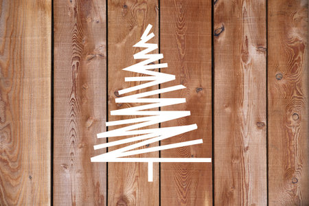 Illustration of a white fir tree on a wooden backgroundの写真素材