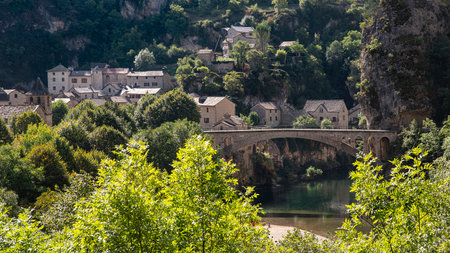 Village of Saint ChÃ©ly du Tarn with its bridge in the Tarn Gorges in Franceの写真素材